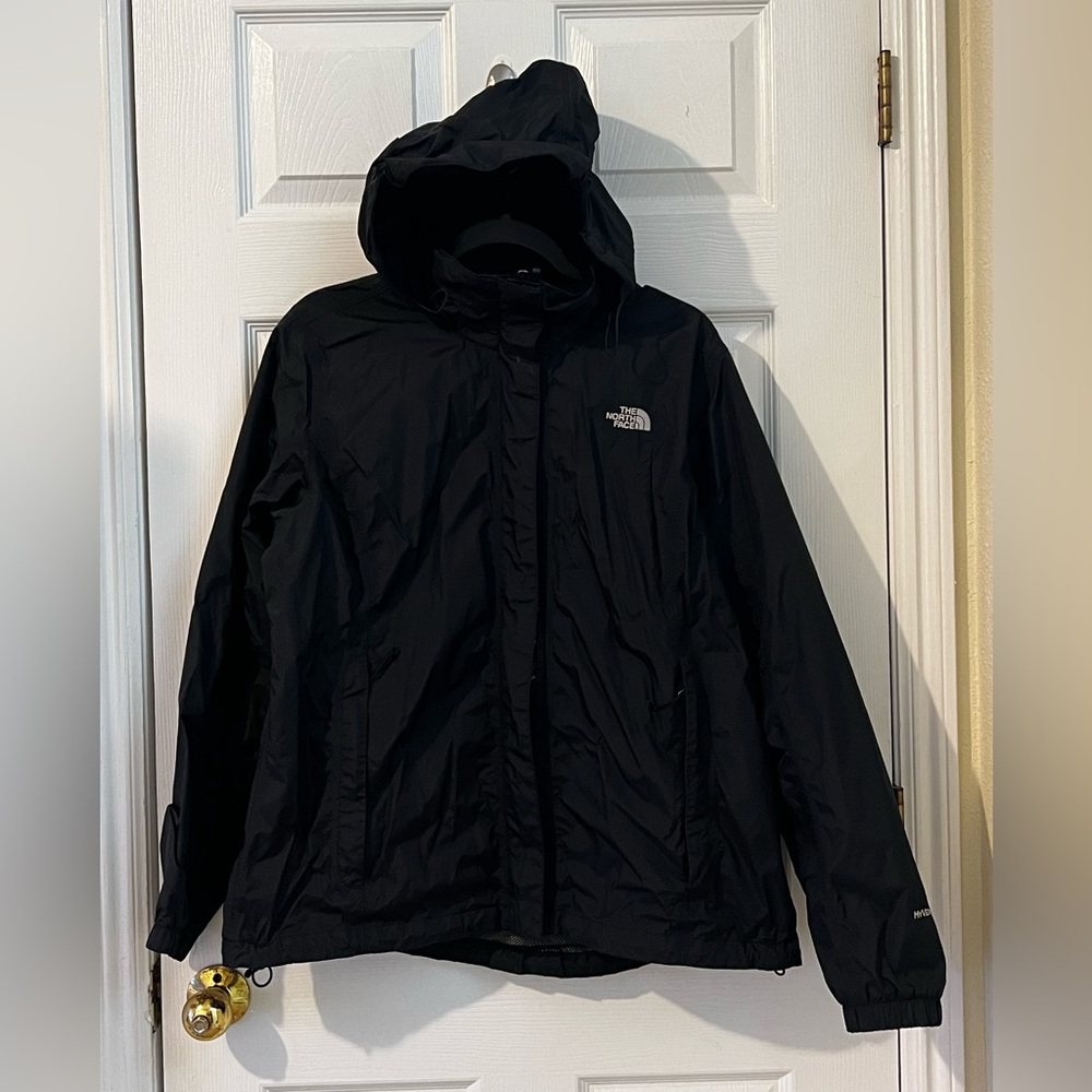 Northface rain and wind resistant jacket with adjustable hood, zipper and Velcro